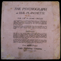 The back label of the Orlando Psychograph, somewhat less ornate than the Hodge specimen, most likely making it a slightly older model. 